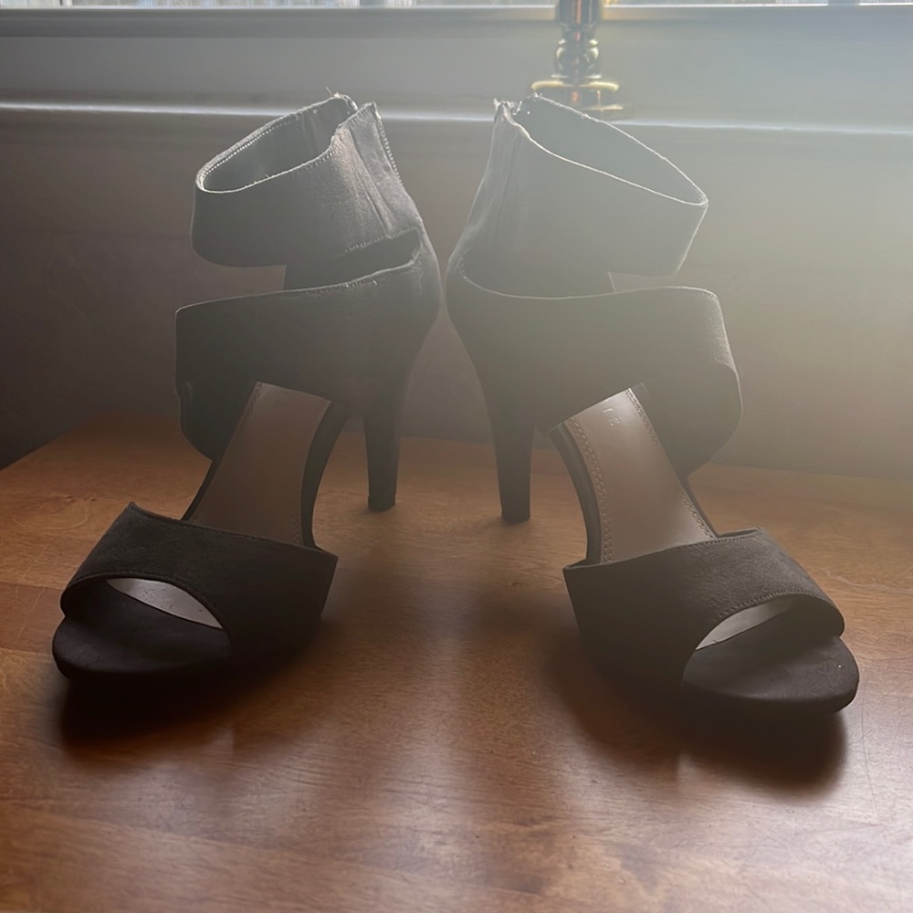 Strap black leather heels